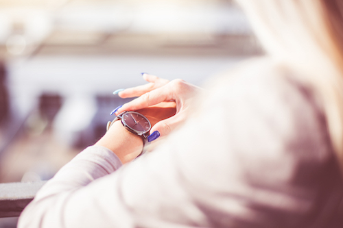 woman-checking-the-time-on-her-fashion-watches-picjumbo-com